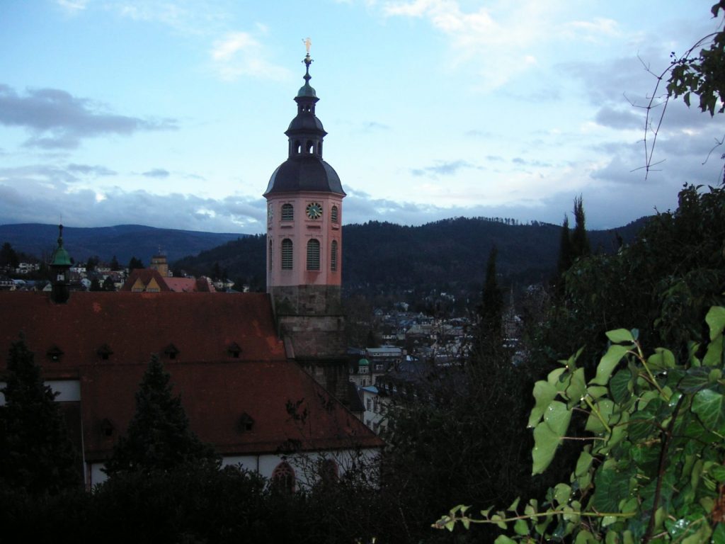 Baden-Baden with the collegiate church tower and the Black Forest hills